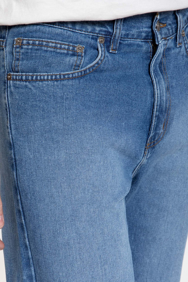 Pantalón vaquero sport ácido