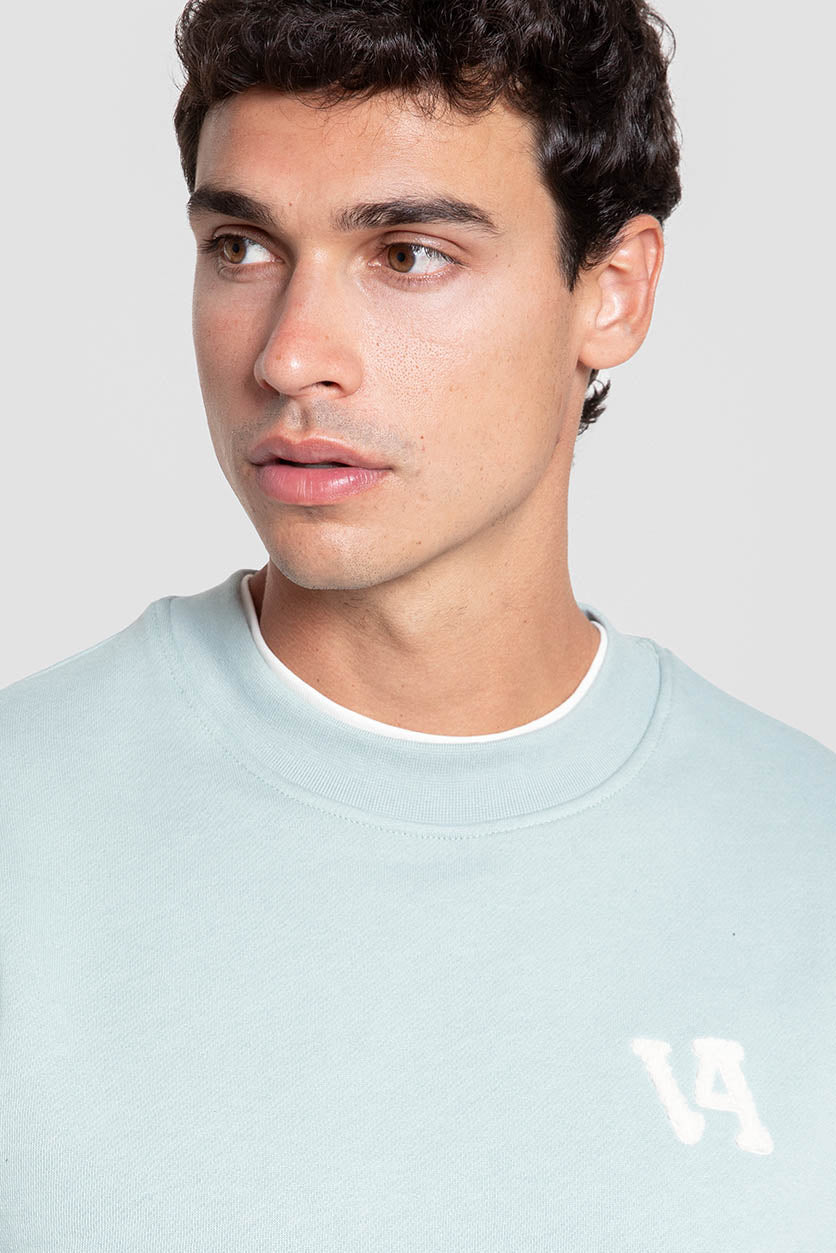 Sudadera verde agua con bolsillo canguro